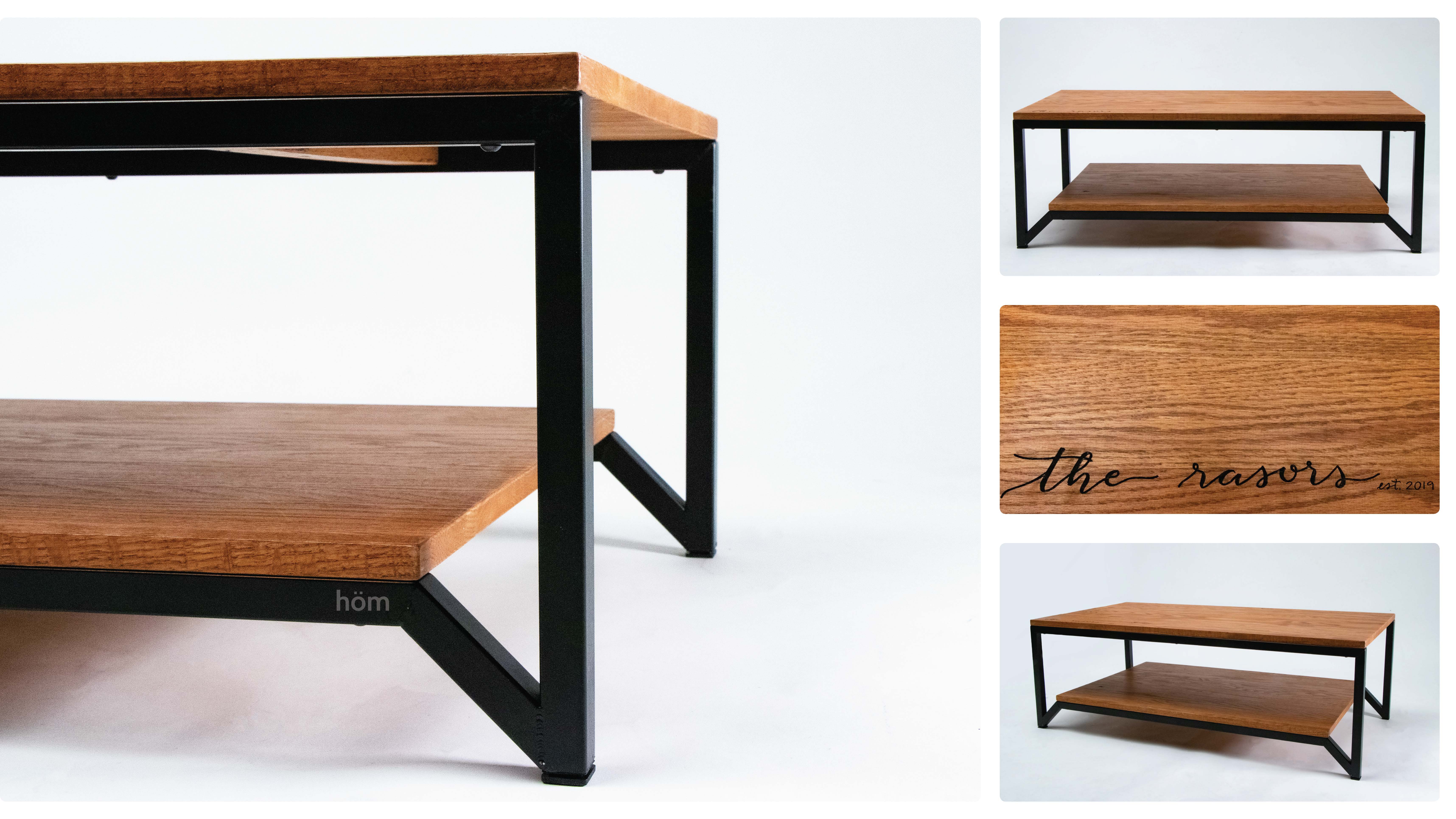 close up of industrial style coffee table with wood accents and black metal legs